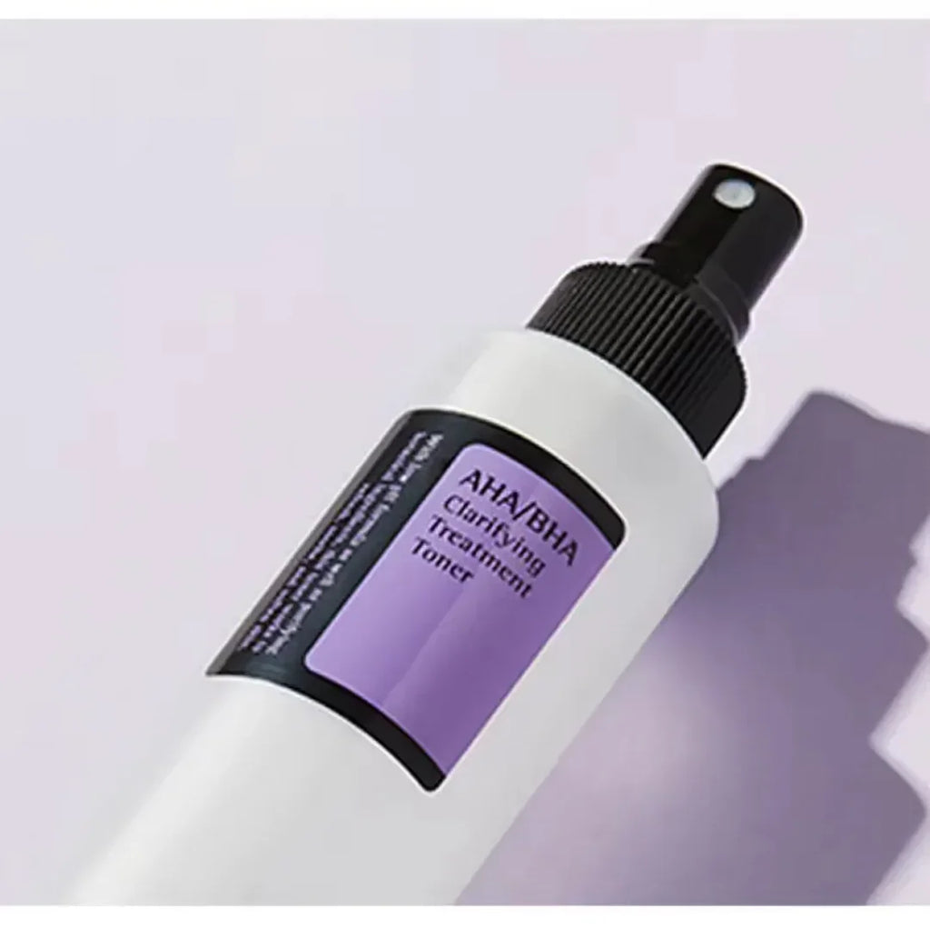 Skincare bottle with a purple label on a light purple background