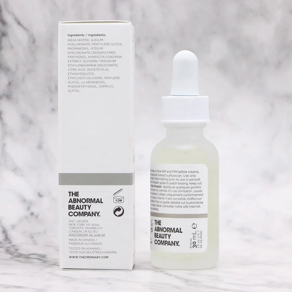 Skincare product and packaging of The Abnormal Beauty Company on a marble background