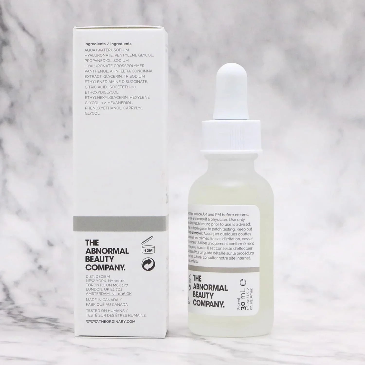 Skincare product and packaging of The Abnormal Beauty Company on a marble background